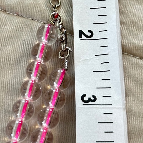 Graduating clear glass bead necklace strung on hot pink string. Lobster clasp - Picture 9 of 13